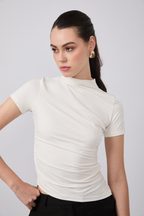 POLO ASIMÉTRICO MANGA CORTA DRAPEADO PERLA - ASIA