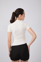 POLO ASIMÉTRICO MANGA CORTA DRAPEADO PERLA - ASIA