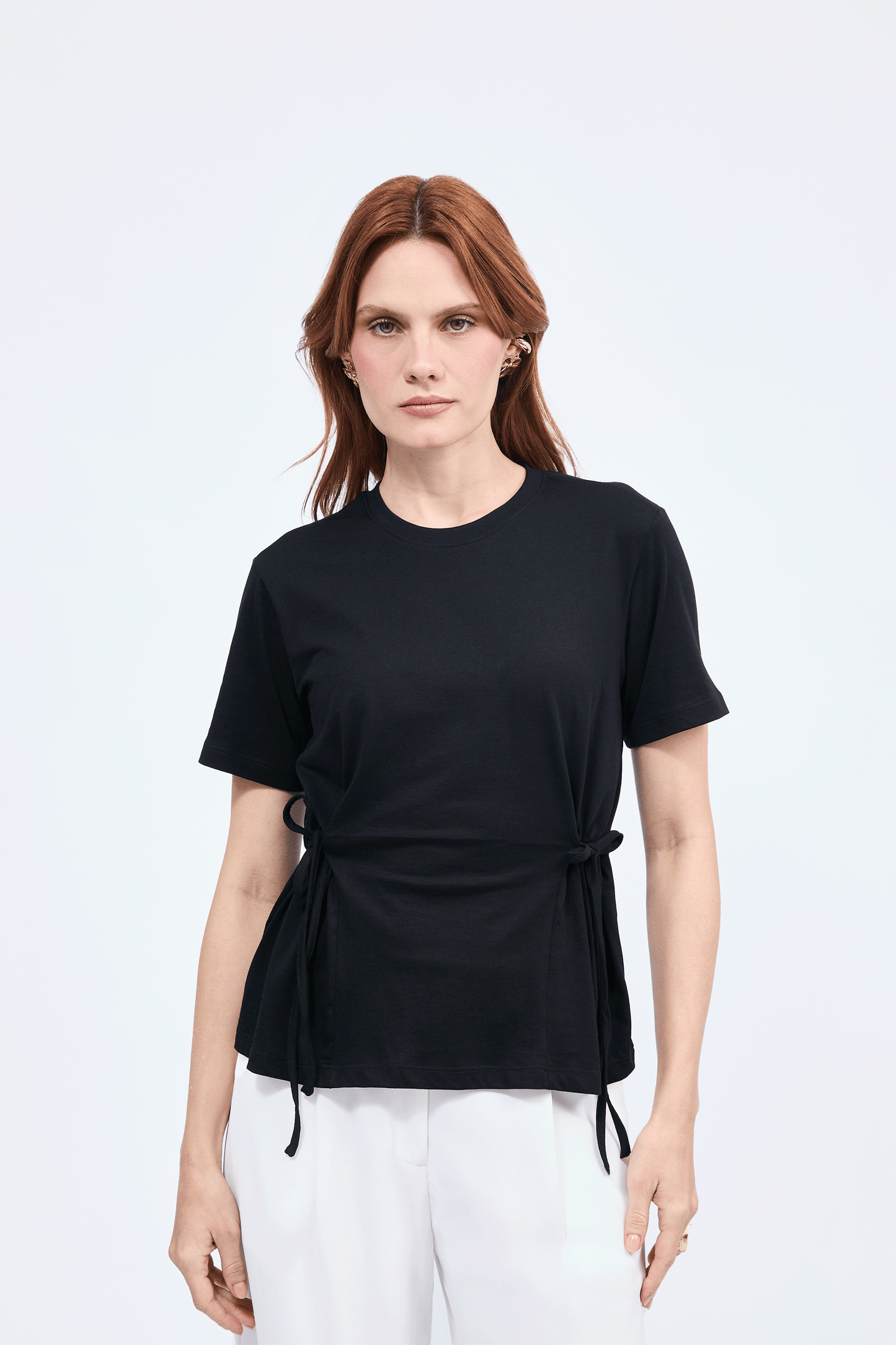 Polo Lia con tiras laterales manga corta Negro