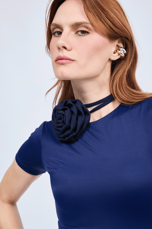 Polo Tess cuello redondo con manga corta azul