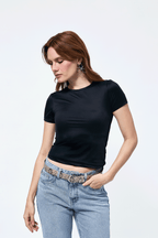 Polo cuello redondo con manga corta negro - Tess